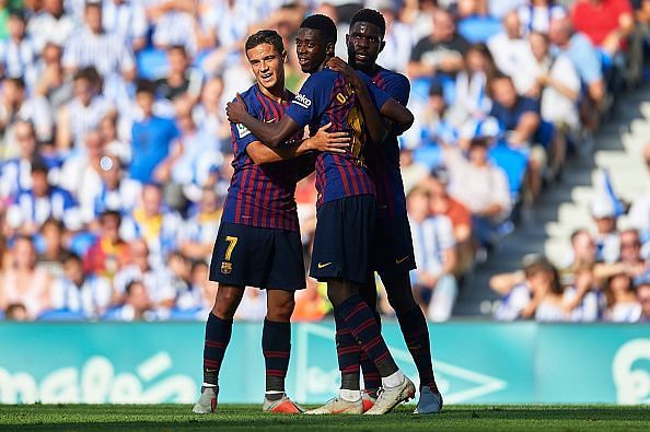 Coutinho (left) and Ousmane Dembele (centre)